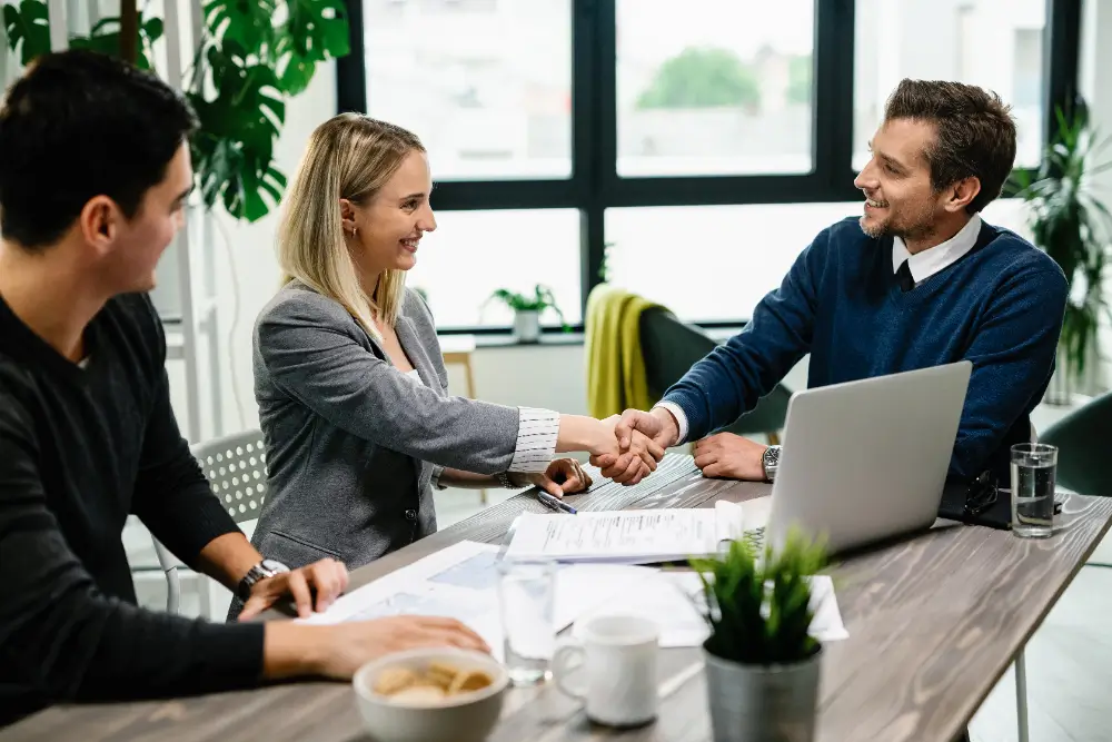 business-man-signing-a-staff-augmentation-agreement-to-outsource-developers-team